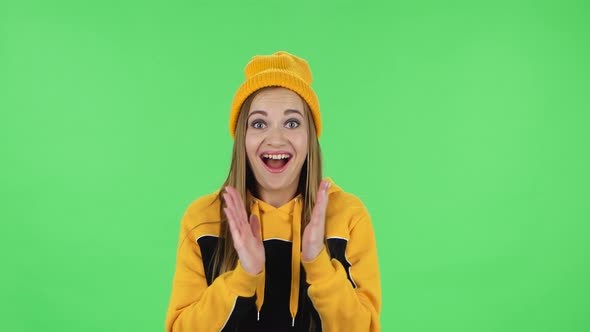 Portrait of Modern Girl in Yellow Hat Is Clapping Her Hands with Wow Happy Joy and Delight