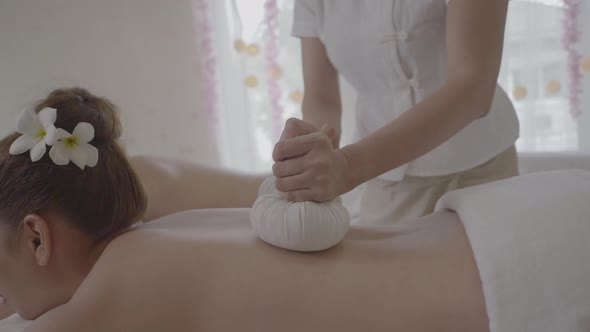 Beautiful Young Woman Massage Multiethnic women relaxing at spa center with a therapy.