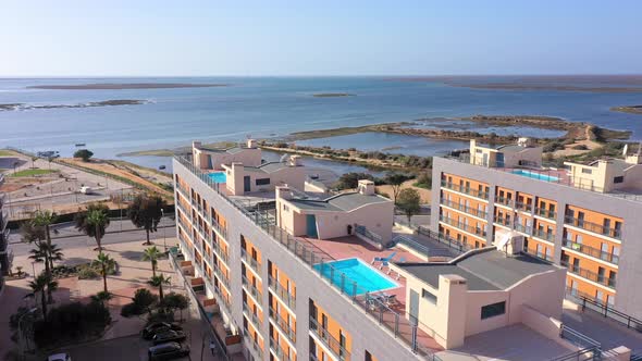 Aerial View of the Urban Area of Portugal in the South of Houses with Modern Infrastructure Swimming