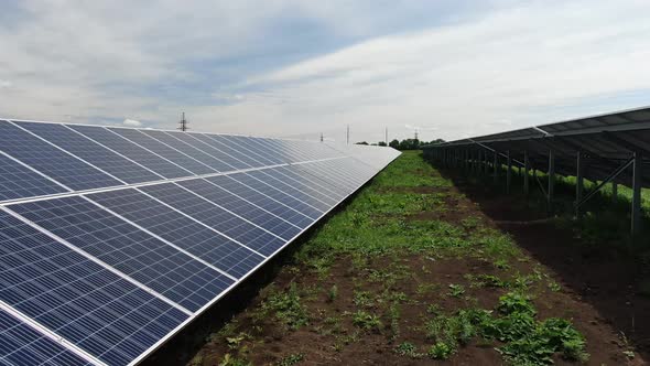 Long Rows of the Solar Panels in the Field, Eco Friendly Energy Source, 