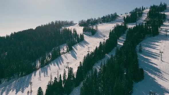 Aerial Drone Flight Over the Ski Resort in Winter