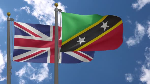 United Kingdom Flag Vs Saint Kitts And Nevis Flag On Flagpole