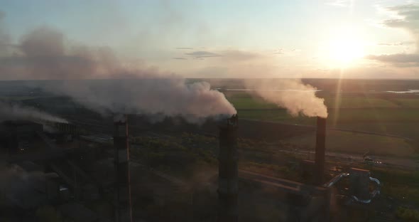 Aerial View. Chimney Pollution Pipes with Grey Smoke. Environmental Pollution Concept Danger To