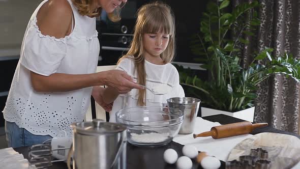 Attractive Young Mother Preparing Everything for Cooking