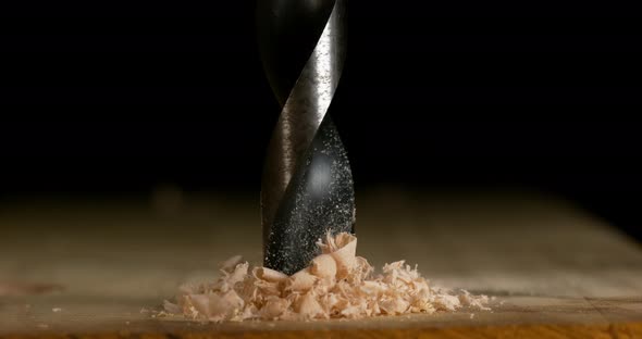 Wood Chip Turning on a Wood Board, Making Chips, Slow Motion 4K