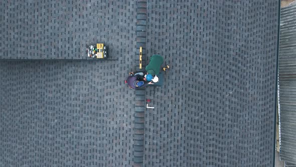 Construction Workers Installing Chimney and Building Construction Concept