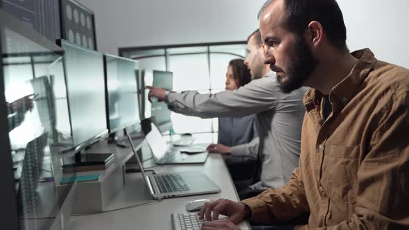 IT Programmer Man Working on Desktop Computer