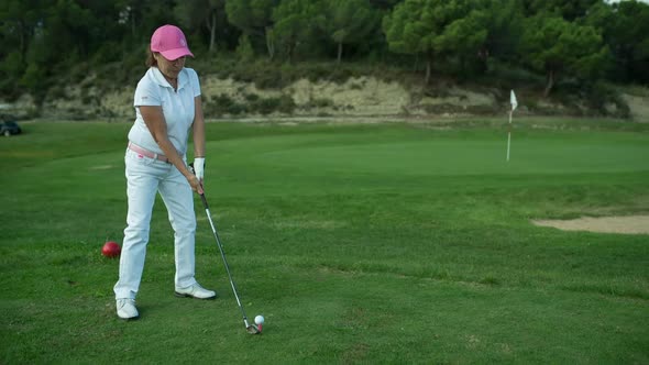 golf woman sport senior outdoors playing