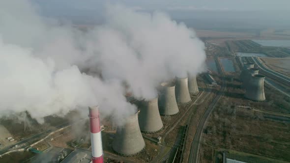 Aerial View of an Industrial Zone Pipes Pouring Thick White Smoke