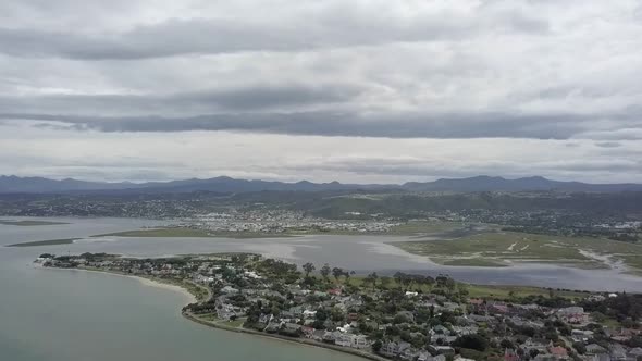 Knysna River Lagoon, quiet Leisure Isle and surrounding hills, aerial