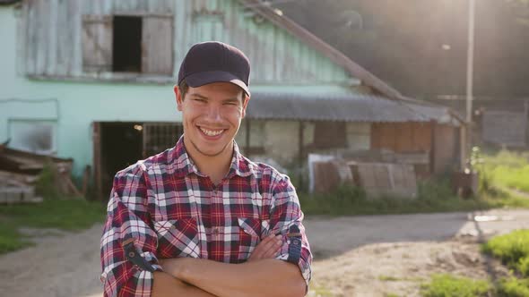 A Sincere Smiling Farmer Rejoices at the Beginning of a New Day