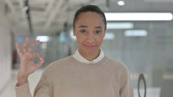 Positive African Woman Showing OK Sign