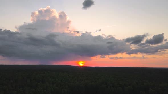 Panorama of a Beautiful Red Evening Sky with the Sun Over the Horizon