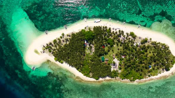 Tropical Island on a Coral Reef, Top View. Digyo Island, Philippines.