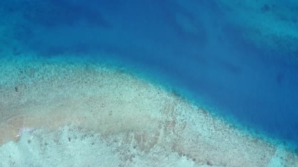 Aerial view abstract of exotic lagoon beach by blue water with sand background