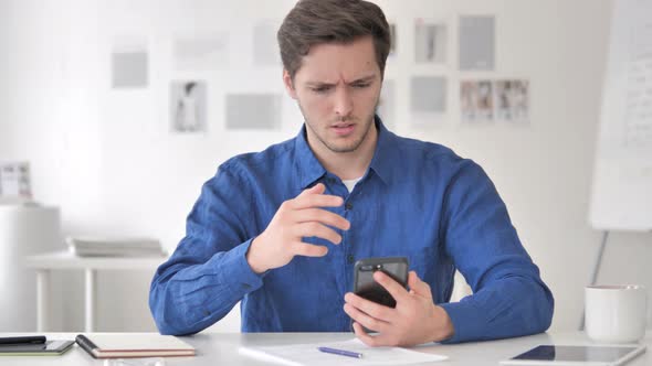 Casual Adult Man Upset by Failure of Investment