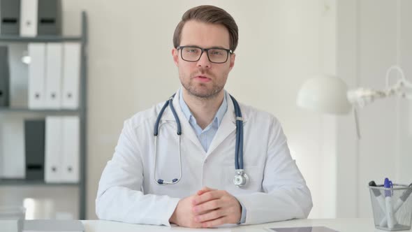 Male Doctor Talking on Video Chat