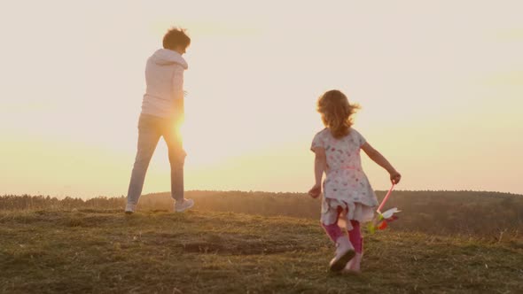 Family Vacation In Nature. Young Family Having Fun.