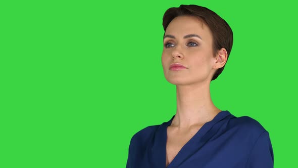 Pretty Woman Hold Paper Take Away Cup with Hot Beverage Black Coffee on a Green Screen, Chroma Key.