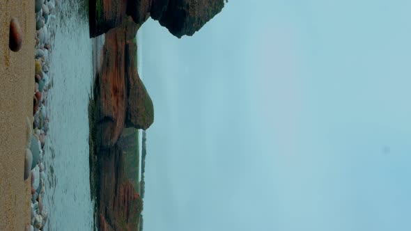 Static Shooting on the Seashore in Cloudy Weather