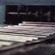 Printed Newspapers are Moved Along Conveyor - VideoHive Item for Sale