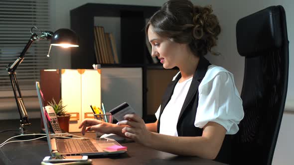 Online Shopping Female Hand Holding A Credit Card And Shopping Online