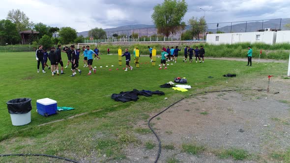 Soccer players training on field