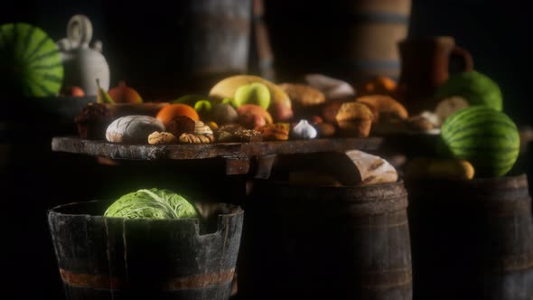 Food Table with Wine Barrels and Some Fruits Vegetables and Bread alt