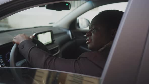 Happy African American Black Man Smiling From His New Car