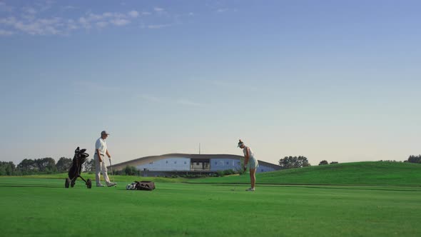 Professional Golf People Play Game on Fairway