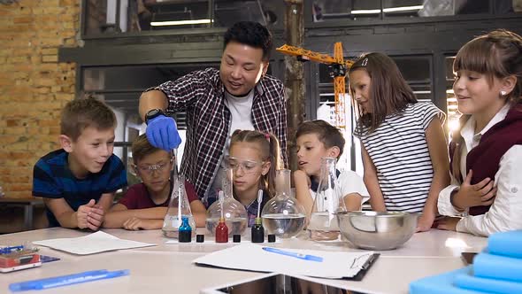  Six Young Children Working with Chemical Reaction in Chemistry Lab