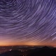 Star trail Time-lapse of the stars behind a lone tree in the night sky. FHD - VideoHive Item for Sale