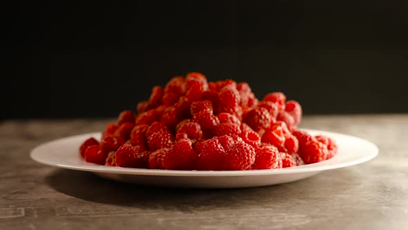 Fresh raspberry fruits as food background.