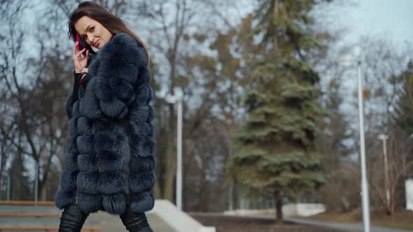 Luxury woman in fur coat