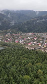 Vertical Video Village in the Carpathian Mountains in Autumn