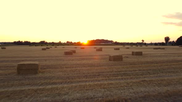 Flying Over a Field with Bales