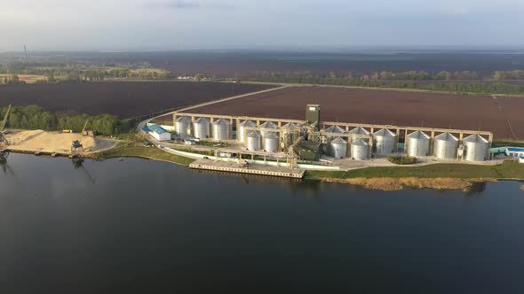 Steel Wheat Silos Aerial at Sunrise