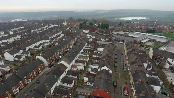 Aerial footage of Terrace Housing in one of Stoke on Trents poorer areas, poverty and urban decline,