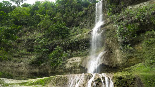 Beautiful Tropical Waterfall. Can-umantad Falls, Bohol, Philippines.