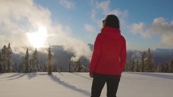 Adventure Woman Hiking on Top of Canadian Mountains