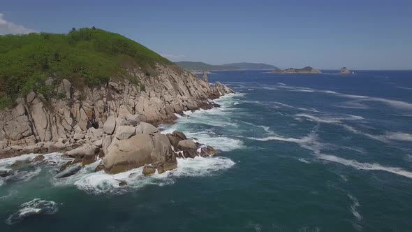 View From a Droneon a Stone Cape Washed By Strong Waves