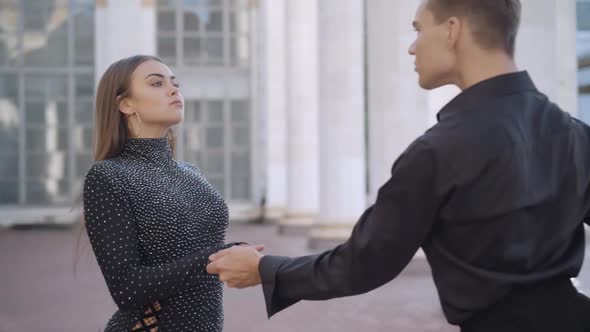 Confident Couple of Dancers Start Performing in Urban City on Sunny Day