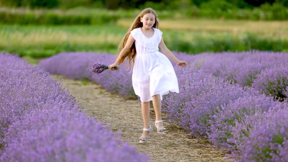 a Girl Running in a Lavender Field