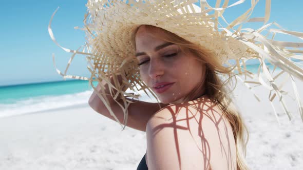 Woman enjoying free time on the beach