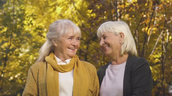 Two Old Women Smiling at Camera