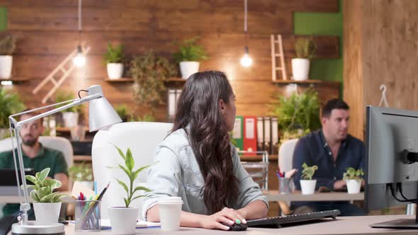 Female Worker Asks Help From a Colleague