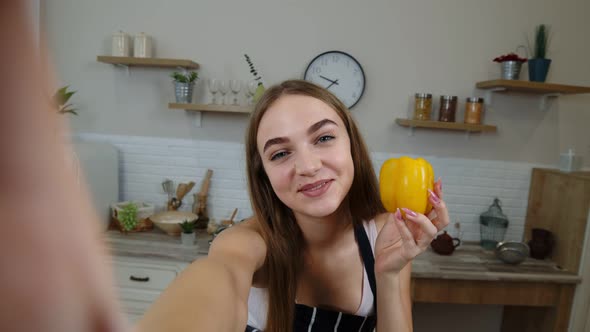 POV Shot of Blogger Girl Making Photos, Taking Selfies for Social Media on Mobile Phone at Kitchen