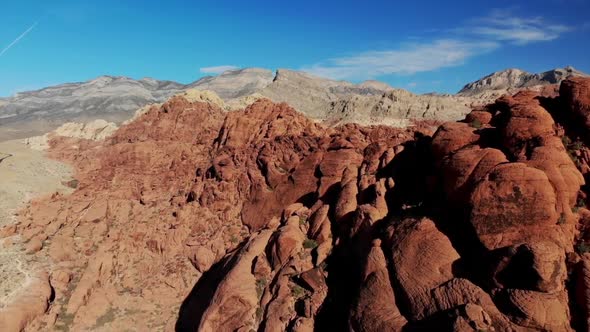Aerial views alongside red sandstone mountains at Red Rock Canyon Park in Nevada
