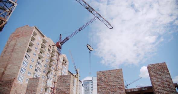 Crane at Building Construction Site, Architecture Apartments. Wide Shot V6