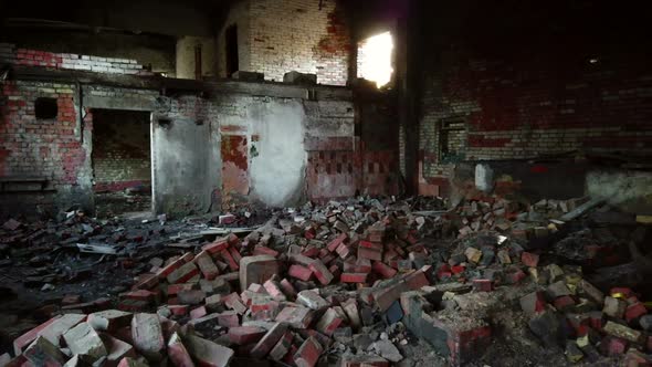 Inside a Ruined Brick Building, Scattered Old Things, Bricks, Garbage and Dirt